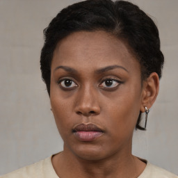 Neutral black young-adult female with short  brown hair and brown eyes