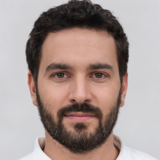 Neutral white young-adult male with short  black hair and brown eyes