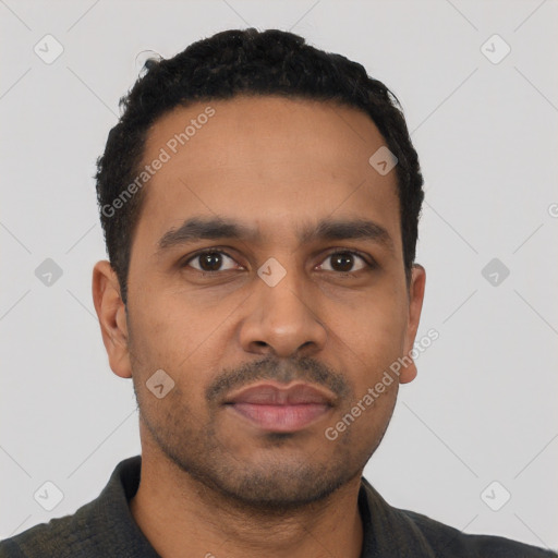 Neutral latino young-adult male with short  black hair and brown eyes