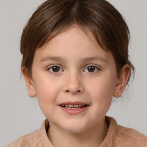 Joyful white child female with medium  brown hair and brown eyes