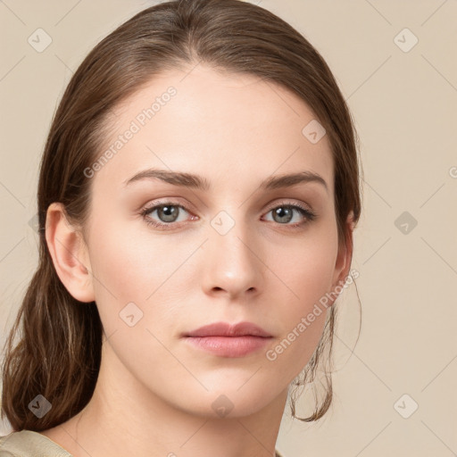 Neutral white young-adult female with medium  brown hair and green eyes