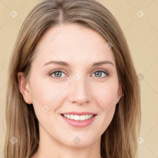 Joyful white young-adult female with long  brown hair and green eyes