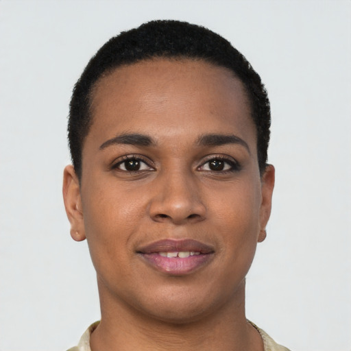 Joyful black young-adult female with short  brown hair and brown eyes