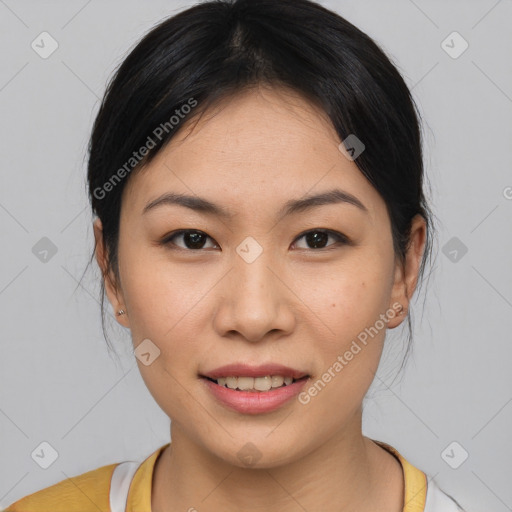 Joyful asian young-adult female with medium  brown hair and brown eyes