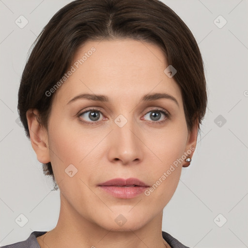 Neutral white young-adult female with short  brown hair and grey eyes