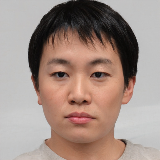 Neutral asian young-adult male with short  black hair and brown eyes