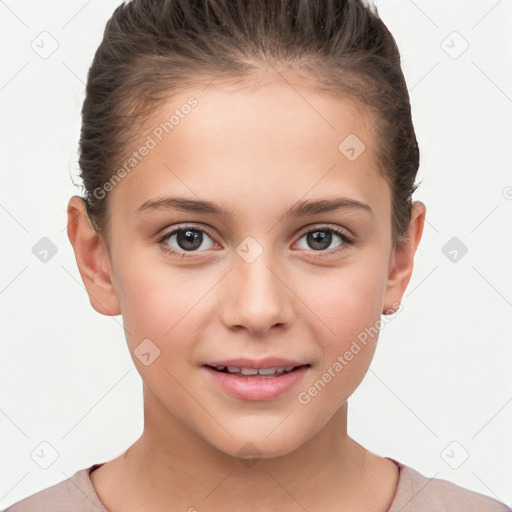 Joyful white child female with short  brown hair and brown eyes