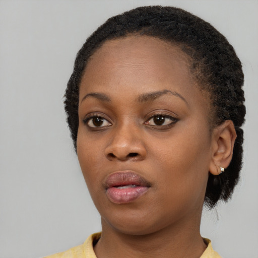 Neutral latino young-adult female with short  black hair and brown eyes