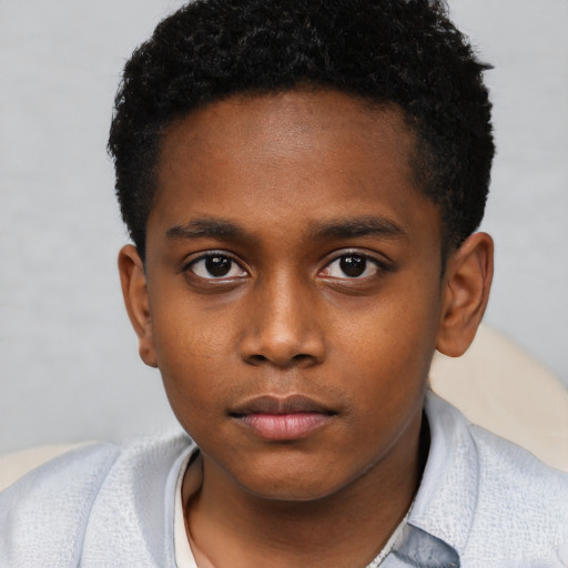 Neutral black child male with short  brown hair and brown eyes