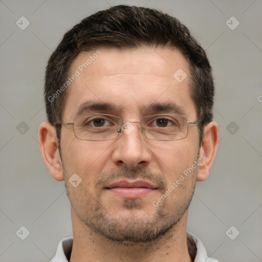 Joyful white adult male with short  brown hair and brown eyes