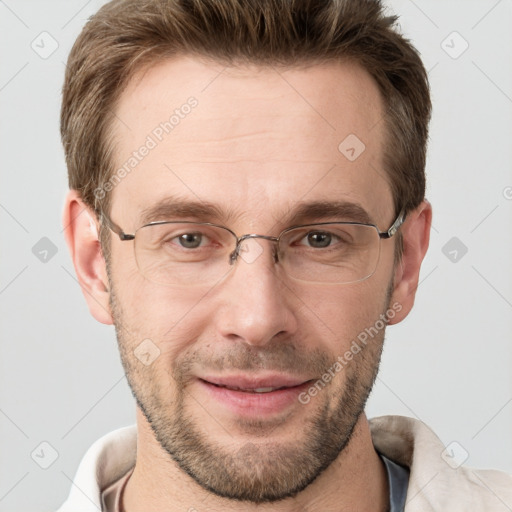 Joyful white adult male with short  brown hair and grey eyes