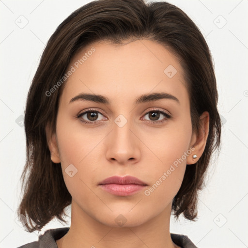 Neutral white young-adult female with medium  brown hair and brown eyes