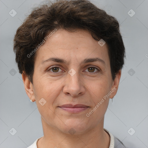 Joyful white adult female with short  brown hair and brown eyes