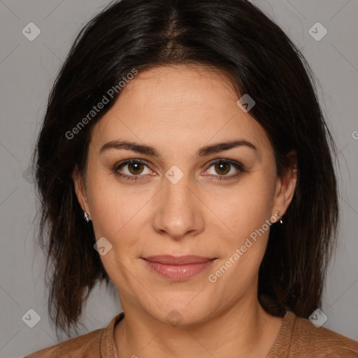 Joyful white adult female with medium  brown hair and brown eyes