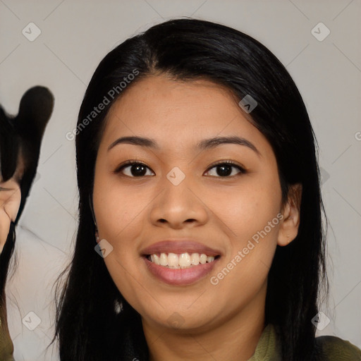 Joyful asian young-adult female with medium  black hair and brown eyes