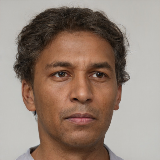 Neutral white adult male with short  brown hair and brown eyes