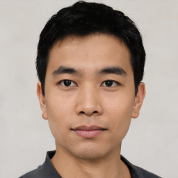 Neutral asian young-adult male with short  black hair and brown eyes