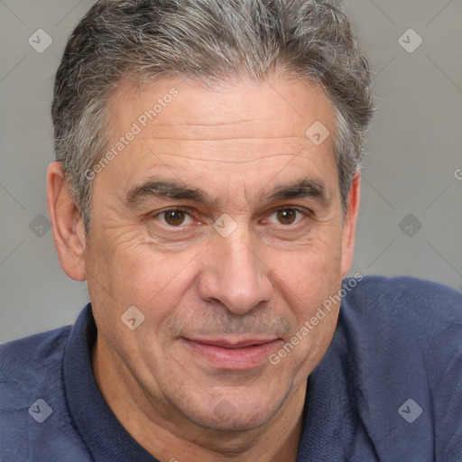 Joyful white middle-aged male with short  brown hair and brown eyes