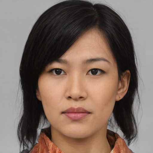 Neutral asian young-adult female with medium  black hair and brown eyes