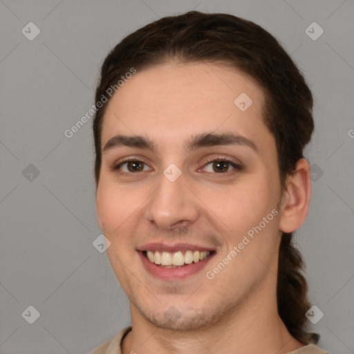 Joyful white young-adult female with short  brown hair and brown eyes