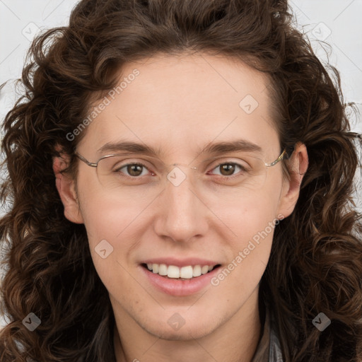 Joyful white young-adult female with long  brown hair and green eyes