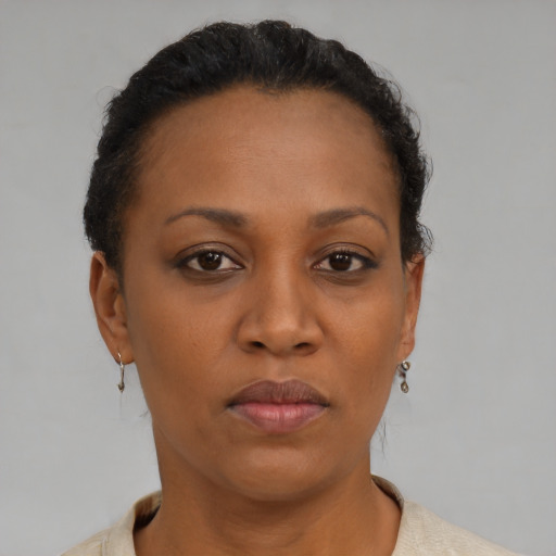 Neutral black adult female with short  brown hair and brown eyes