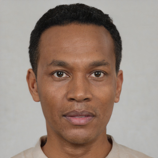 Neutral black young-adult male with short  black hair and brown eyes