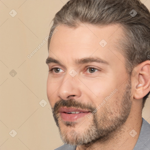 Joyful white adult male with short  brown hair and brown eyes