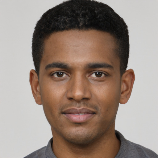 Neutral black young-adult male with short  black hair and brown eyes