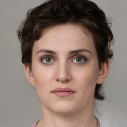 Neutral white young-adult female with short  brown hair and grey eyes