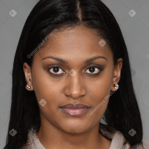 Joyful black young-adult female with long  brown hair and brown eyes