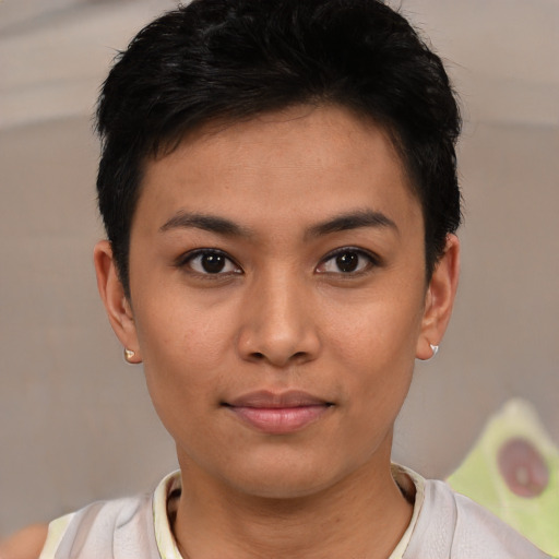 Joyful latino young-adult female with short  black hair and brown eyes