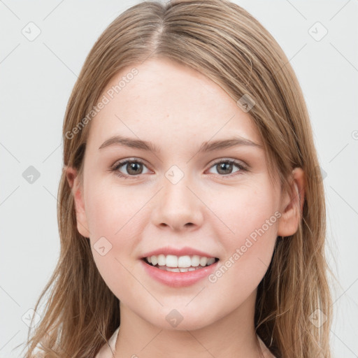 Joyful white young-adult female with long  brown hair and grey eyes