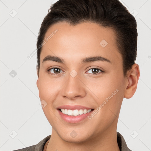 Joyful white young-adult female with short  brown hair and brown eyes