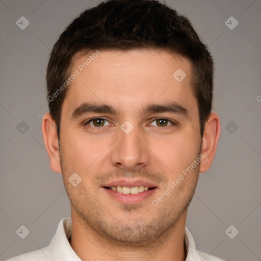 Joyful white young-adult male with short  brown hair and brown eyes