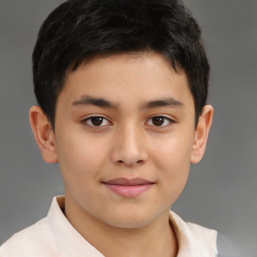 Joyful white child male with short  brown hair and brown eyes
