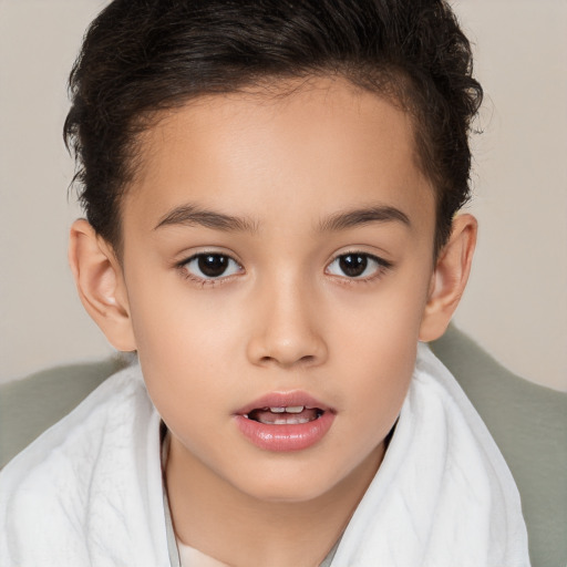 Joyful white child female with short  brown hair and brown eyes