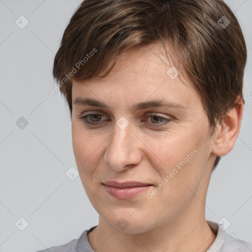 Joyful white young-adult female with short  brown hair and brown eyes