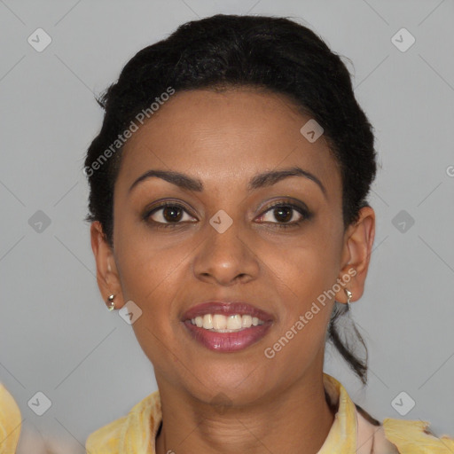 Joyful black young-adult female with short  brown hair and brown eyes