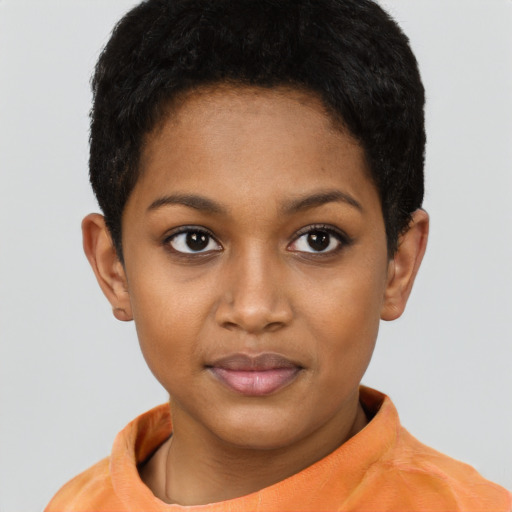 Joyful black young-adult female with short  brown hair and brown eyes