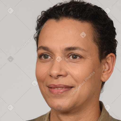 Joyful white adult female with short  brown hair and brown eyes