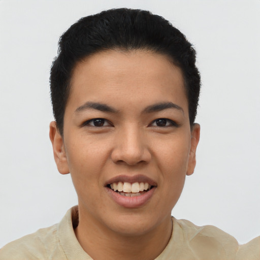 Joyful latino young-adult female with short  black hair and brown eyes
