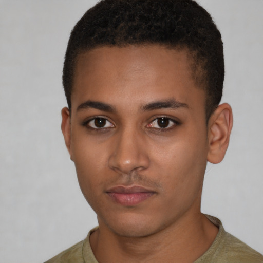 Neutral latino young-adult male with short  brown hair and brown eyes