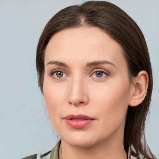 Neutral white young-adult female with medium  brown hair and grey eyes