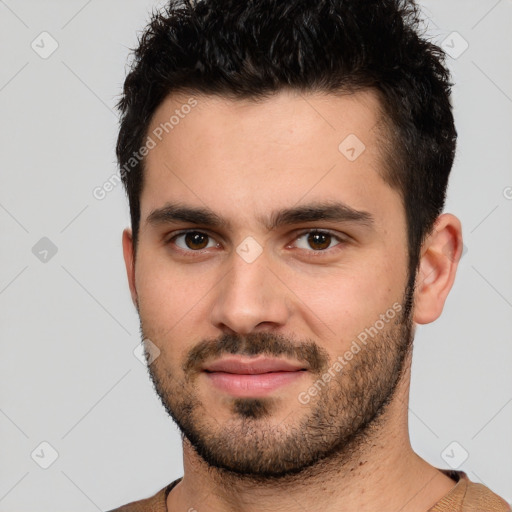 Neutral white young-adult male with short  brown hair and brown eyes