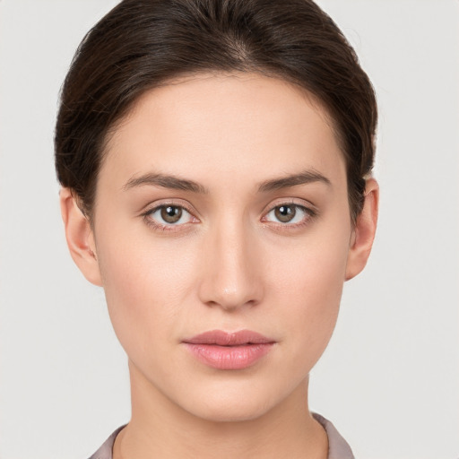 Neutral white young-adult female with short  brown hair and brown eyes