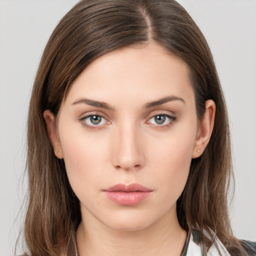 Neutral white young-adult female with medium  brown hair and brown eyes