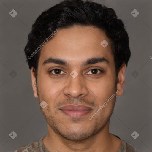 Joyful latino young-adult male with short  brown hair and brown eyes