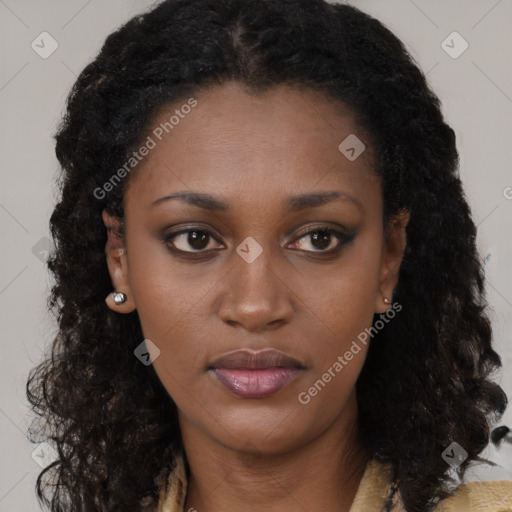 Neutral black young-adult female with long  brown hair and brown eyes