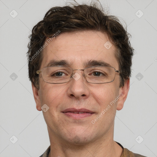 Joyful white adult male with short  brown hair and grey eyes